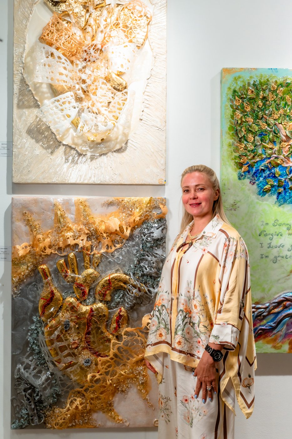 Natasha Sosnova with her work at Art Santa Fe 2026