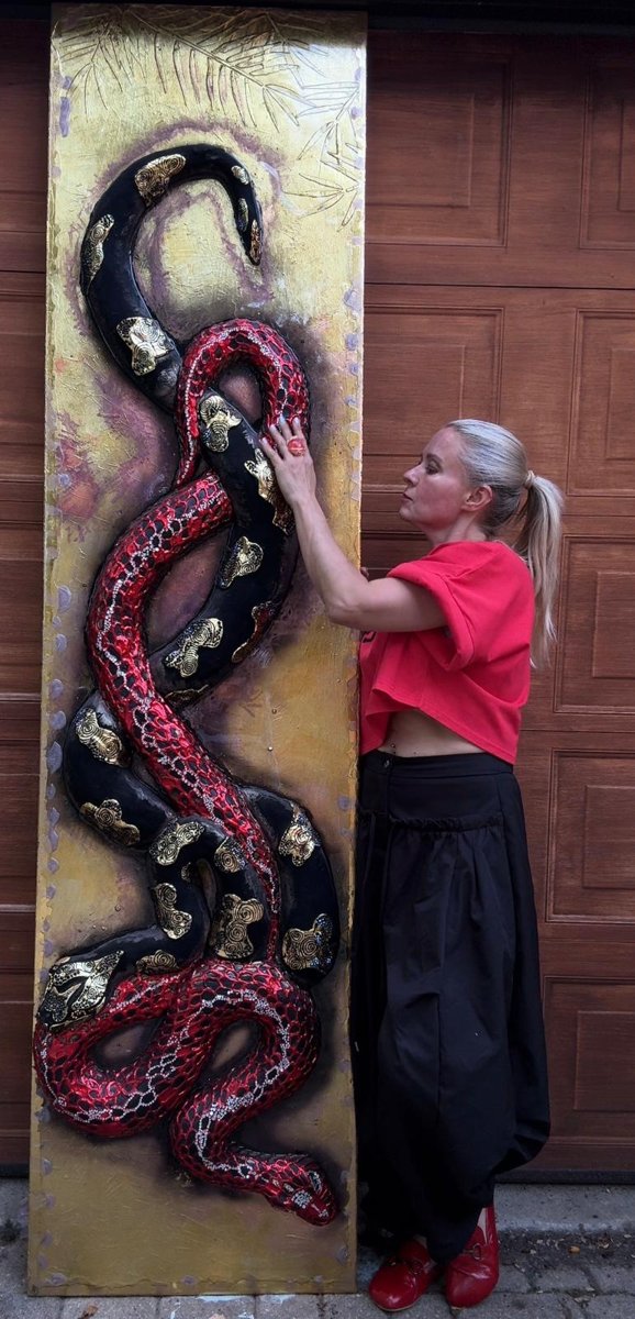 Natasha with Wisdom & Power, an eight-foot sculptural panel